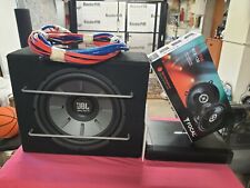 Ampli  alpine avec caisson et enceinte l'ensemble est pratiquement neuf.