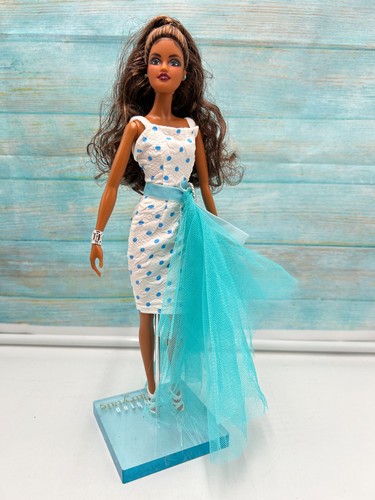 Barbie noël 2024 relookée - barbie,
