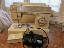 Machine à coudre  complète modèle viva singer