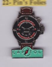 Pin's Folies **  Montre Paris Dakar Le cap Le capitol Rallye
