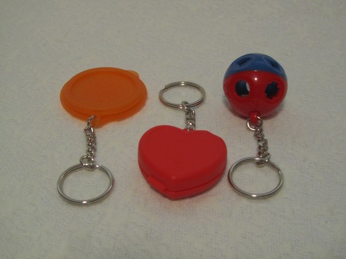 New tupperware keychains set - new, -set