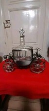 Vintage carrosse musical  support fer noir  ,bouteille verre,roues plastiques. 