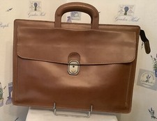 beau cartable GERARD HENON  cuir camel ,bon Etat