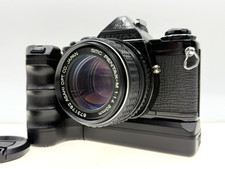 *Exc+5* Appareil photo reflex