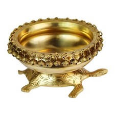 Brass Urli Vessel on Tortoise