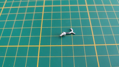 Attache capot pièce miniature