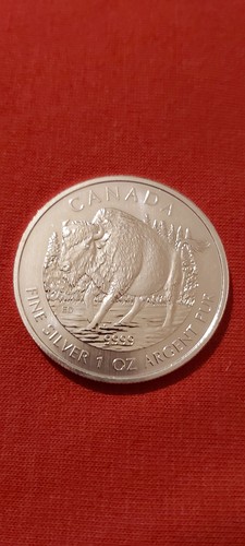 Pièce argent canada once - en,