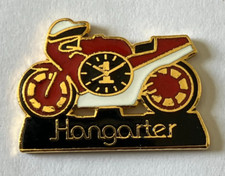105 - Pin's HORLOGERIE MONTRE HANGARTER VITESSE ET PRECISION - SALON DE LA MOTO