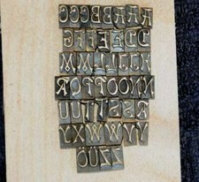 Police de Caractères à dorer fer reliure dorure bronze laiton relieur décoratif´