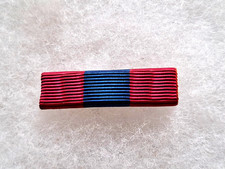 Une barrette de médaille Défense Nationale.
