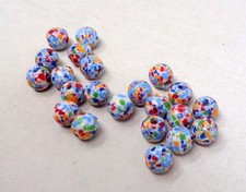 Lot de 22 perles anciennes en
