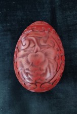 Objet en cinabre en forme