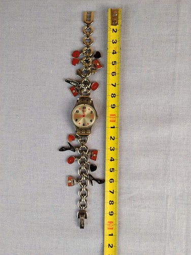 Rare bracelet breloque montre