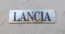 Ancien petit insigne emblème LANCIA mascotte plaque badge voiture metal