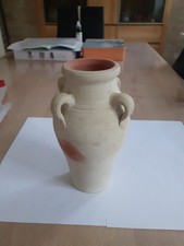 1 petite poterie en terre