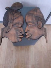 belles sculptures têtes Africaines en bois à suspendre