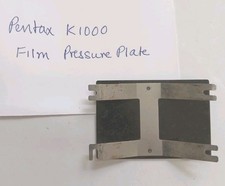 Plaque de pression de film