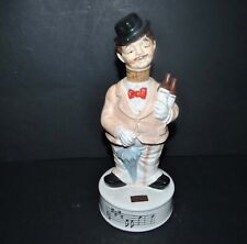 Bouteille Musicale vintage XXe en porcelaine Gentleman Serveur Boite à musique