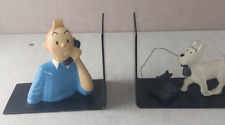 Paire de serre livres, Tintin et Milou au téléphone, résine polychrome + métal