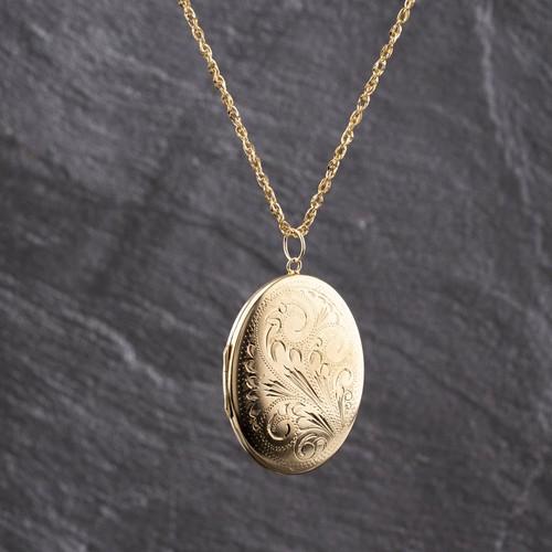 Pendentif médaillon gravé - , à