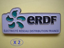 Deux Pin's Publicitaires