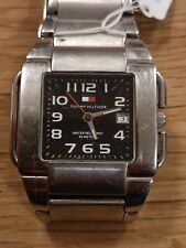 Montre Tommy Hilfiger water resistant fonctionne pile à changer quartz P447