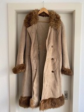 « Manteau long femme peau