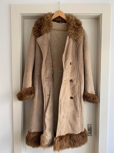 Manteau long femme peau - «,