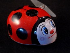 Ancien jouet mécanique coccinelle TT japan tôle litho années 60 style joustra