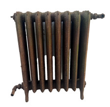 Ancien radiateur sur pied a huit lames fleuries en fonte de fer XX siècle