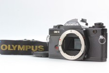 Appareil photo reflex argentique 35 mm Olympus OM-4 fonctionne [presque...