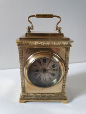 Pendulette de voyage en bronze