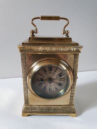 Pendulette voyage bronze - de,