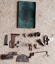MACHINE à COUDRE : LOT DE PIECES DETACHEES + MANUEL SINGER 15k88