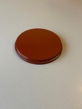 socle rond peint en marron