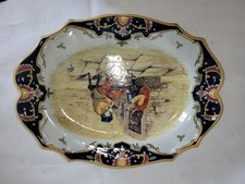 Plat signé "GM" Geo Martel Desvres . Ancien plat en faïence