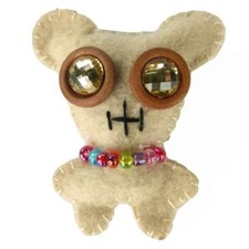 Broche enfant personnage beige