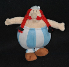 Peluche doudou Obélix PARC ASTERIX 2010 rose bleu blanc 17 cm TTBE