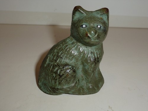 Antique cast metal miniature - cast,