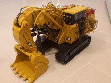 Cat 6090 FS Pelle bute Modèle