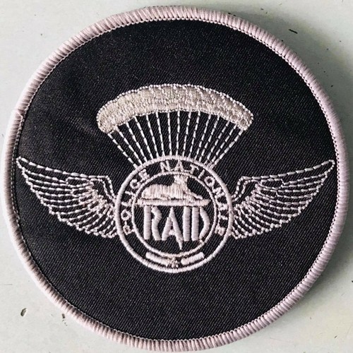 Police brevet raid rond - /,