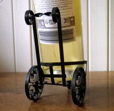 Ancien petit caddie porte bouteille de table en fer forgé