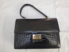 Magnifique sac à main en cuir noir des années 50. Excellent état