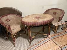 Salon de jardin ancien en rotin à restaurer