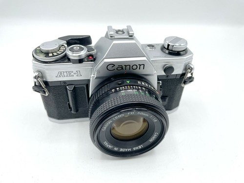 Chrome canon film camera - chrome,