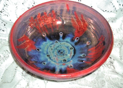 Ancienne poterie passoire