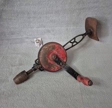 Ancienne chignole à main rouge