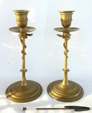 Lot de 2 bougeoirs en Bronze, pas de signature, dans le goût Barbedienne,serpent