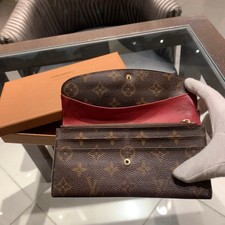 Sac à main portefeuille Louis Vuitton monogramme Emily long à deux volets ave...
