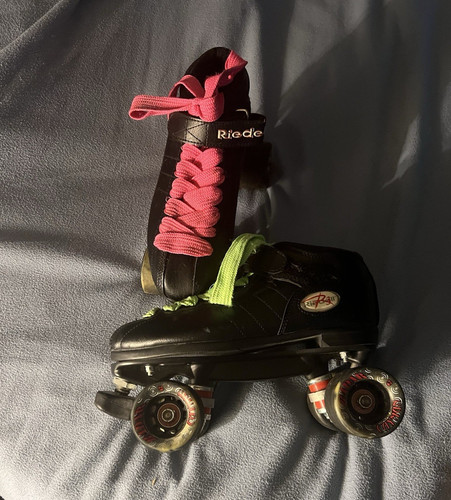 Riedell black quad roller - quad,